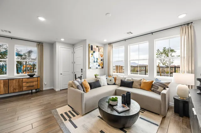 A living room with a large window.