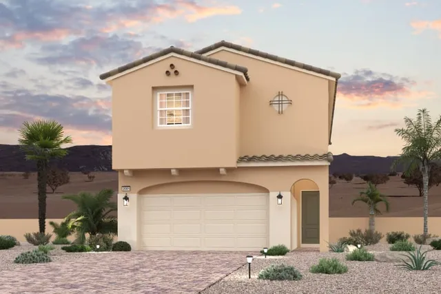A house with a garage and palm trees.