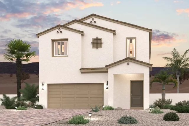 A house with a garage and palm trees.