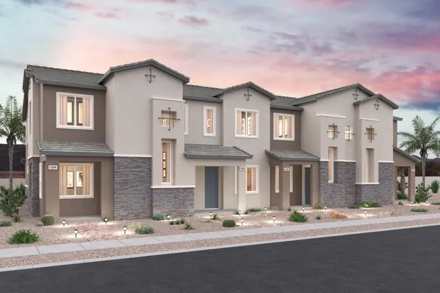 A large house with a driveway.