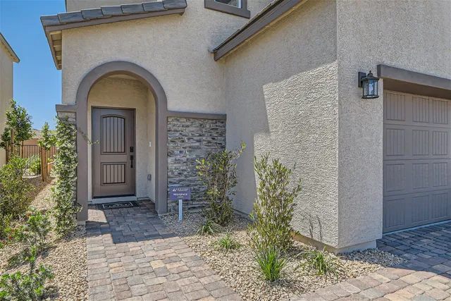 A building with a stone walkway.