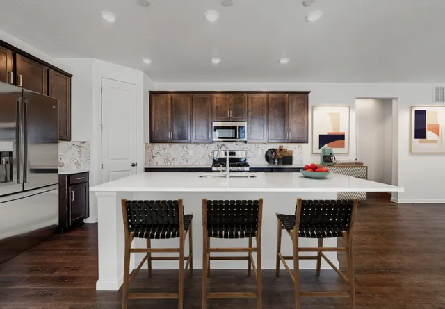 16948 W 92nd Drive in Trailstone Town Collection — representation photos
