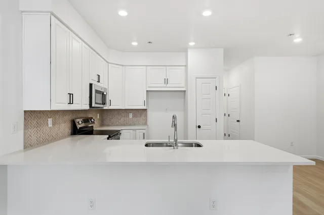17205 W 91st Lane in Trailstone Townhomes - The Westerly Collection — representation photos