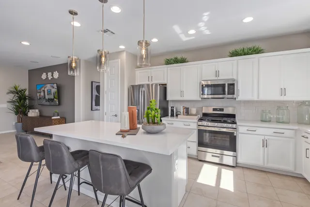 14381 W Soft Wind Drive in Rio Vista at Rancho Mercado — representation photos