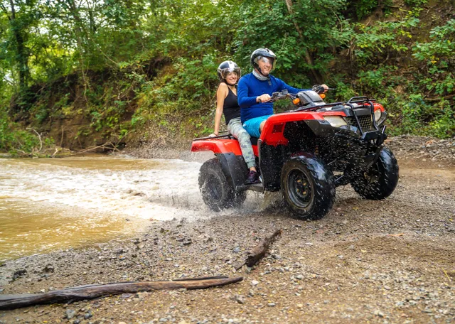 Dad and daughter on ATV