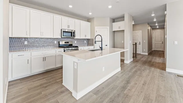 3310 N Denali Street in The Aurora Highlands Town Collection — representation photos