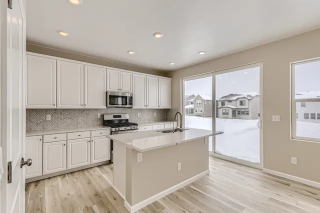 3330 N Denali Street in The Aurora Highlands Town Collection — representation photos