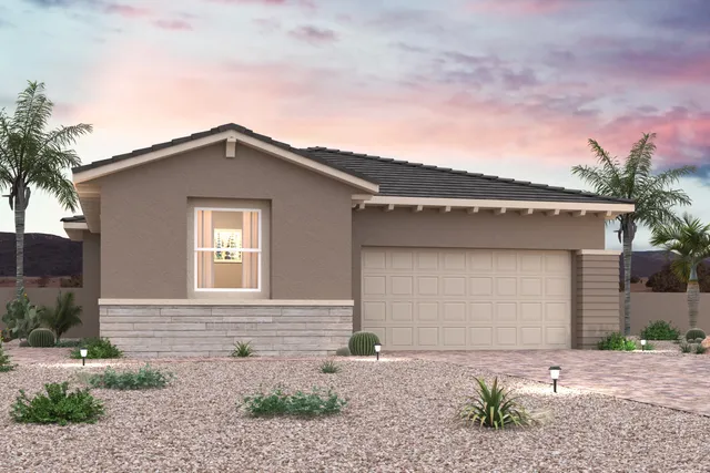 A house with a garage and trees.