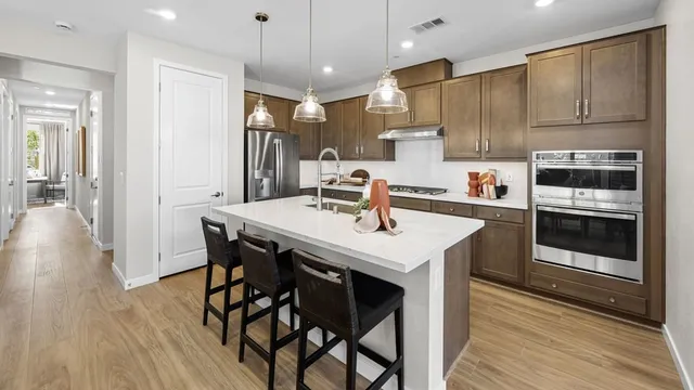 318 Cabasa Place in Opus at Cadence — representation photos