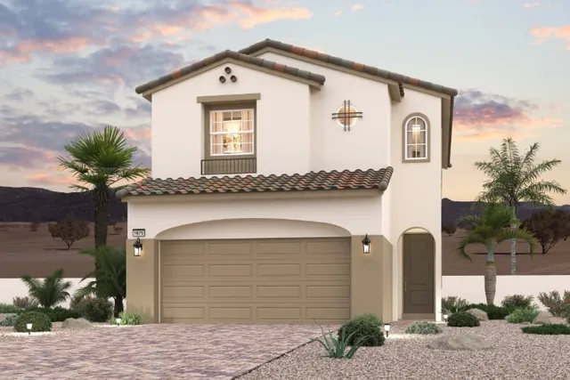 A house with a garage and palm trees.