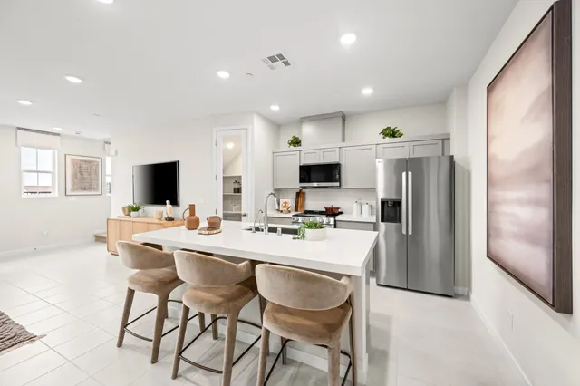A kitchen with a large island.